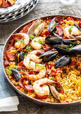  Paella Valenciana！這道西班牙飯融合了鮮美的海鮮和浓郁的肉香，為你的味蕾帶來一場難忘的盛宴！